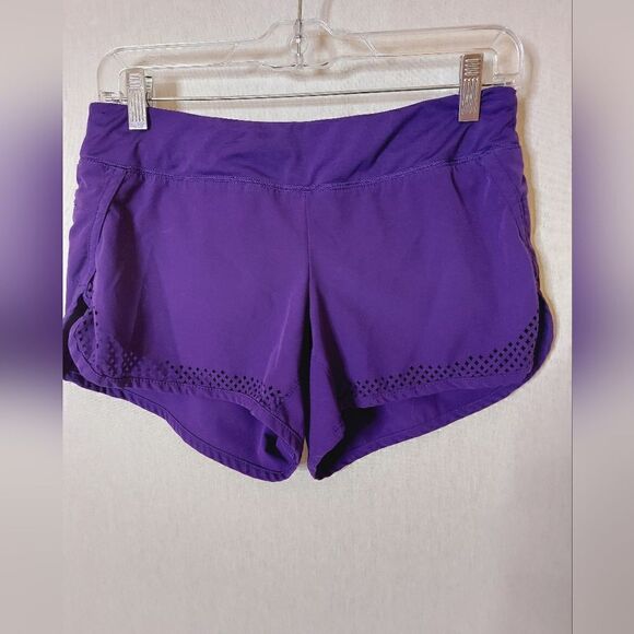 Athleta laser cutout hem purple 3" running shorts - Picture 4 of 10